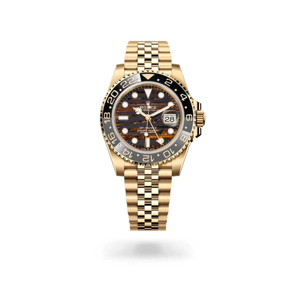 Rolex Oyster Perpetual GMT-Master II, 40 mm, 18 kt yellow gold, 18 kt yellow gold, Tiger iron (metamorphic rock with golden and orangey tints) dial